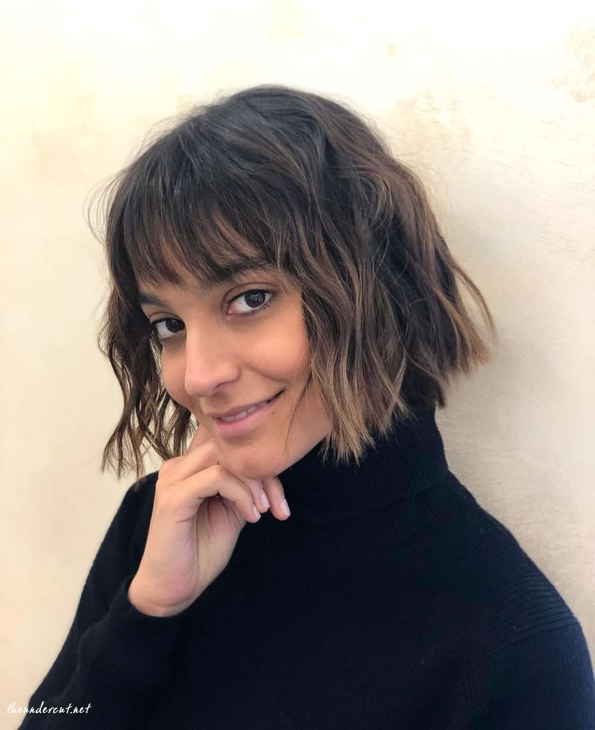 shaggy wavy bob with blunt bangs