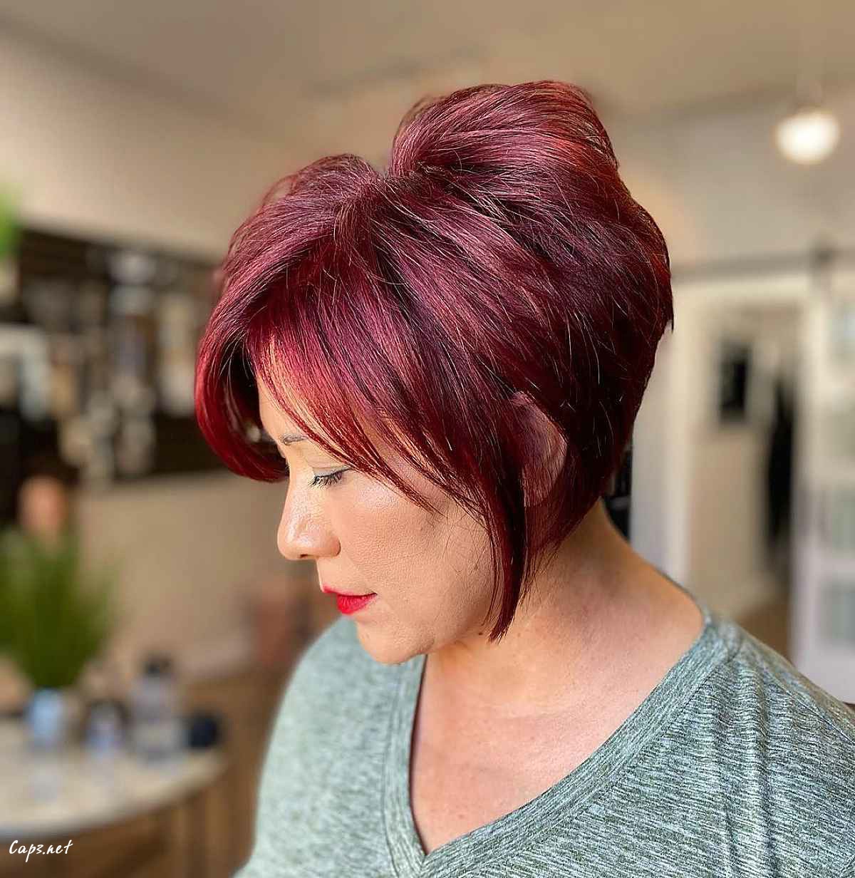 side parted long layered pixie cut with choppy layers for round faces