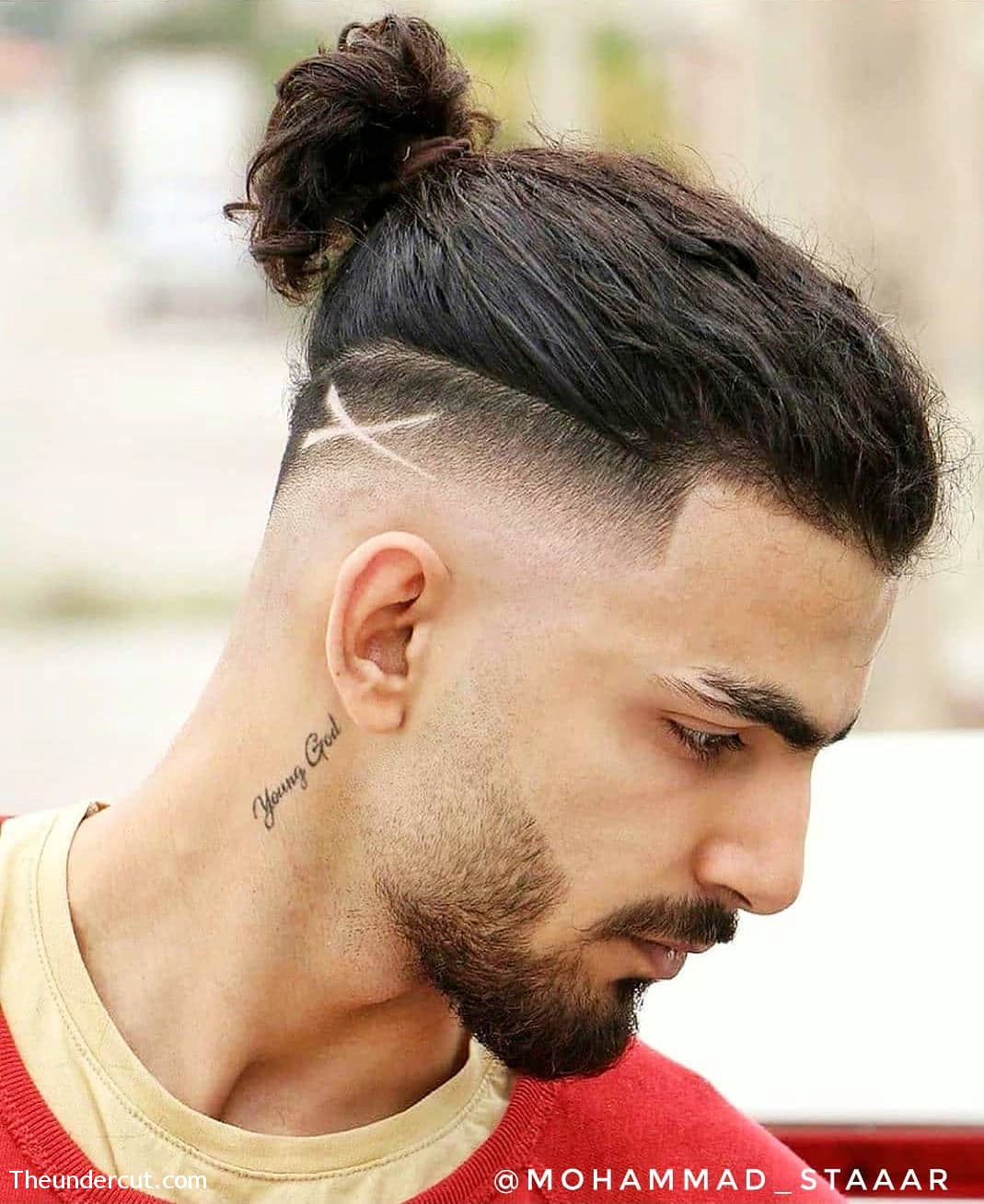Hipster Hairdo With A Bun Detail