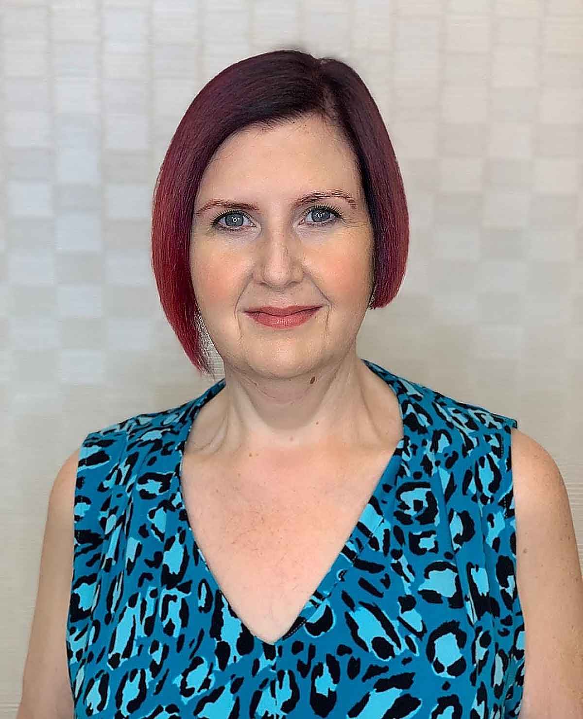 asymmetrical chin length bob for ladies over 60