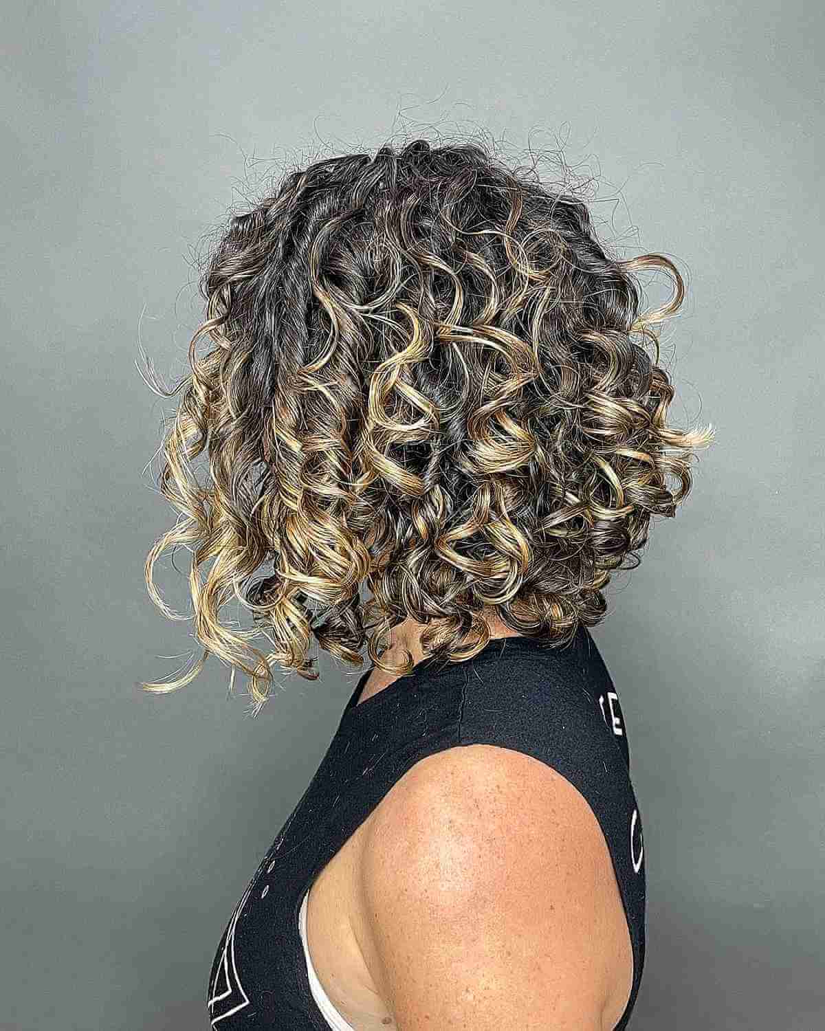 blonde balayage bob with curls