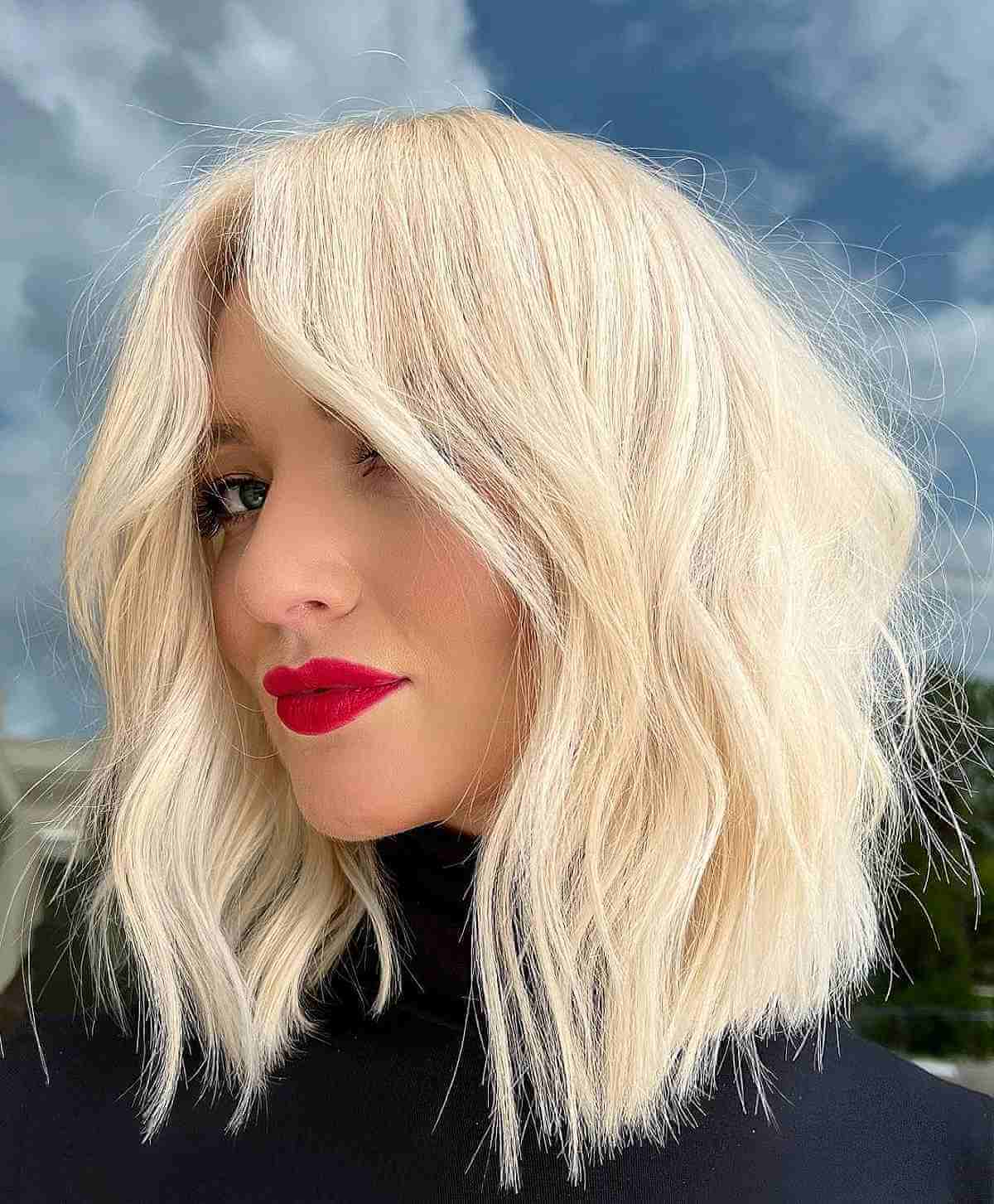 bright blonde textured choppy bob
