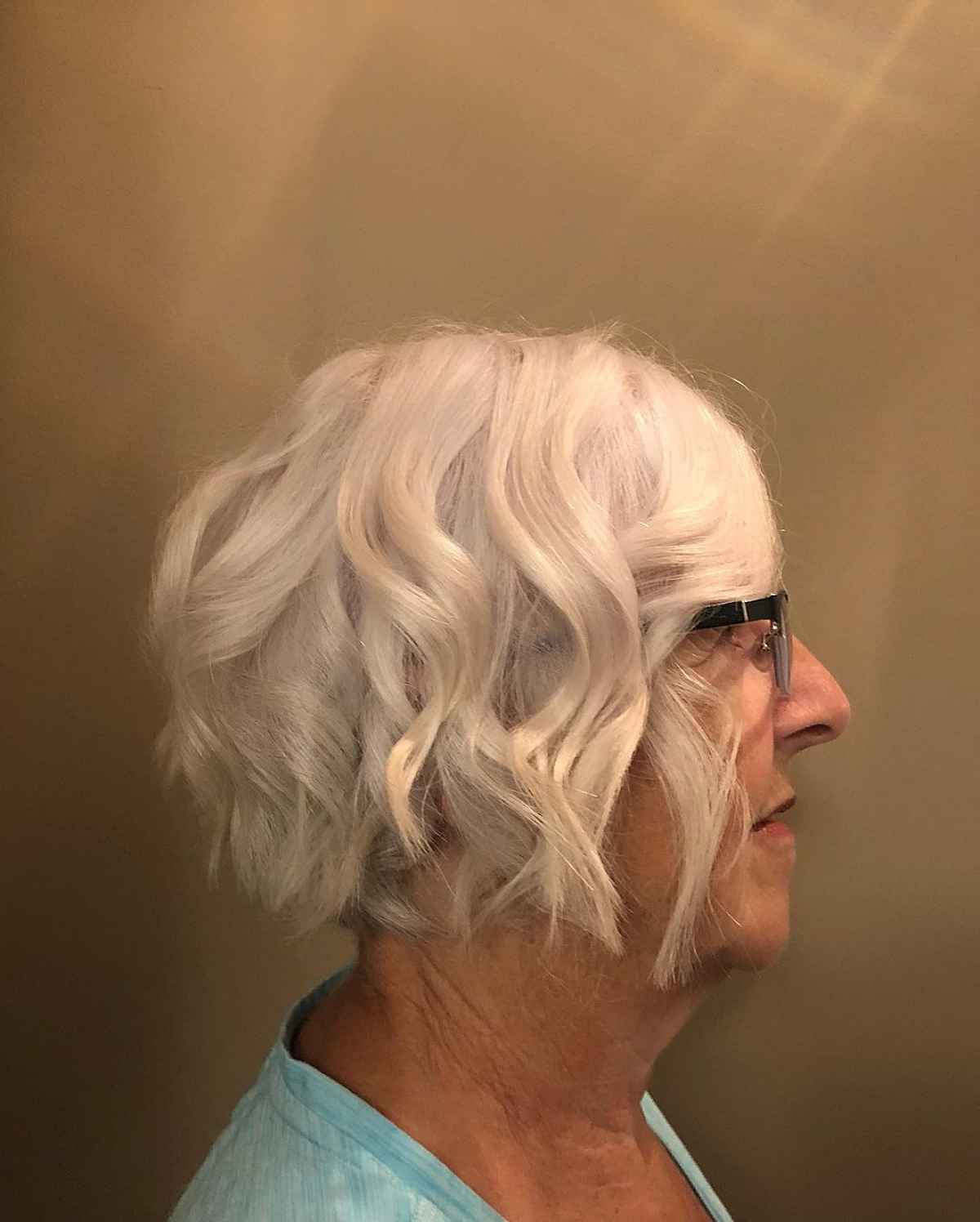 chin length bob for older women over sixty with glasses 1
