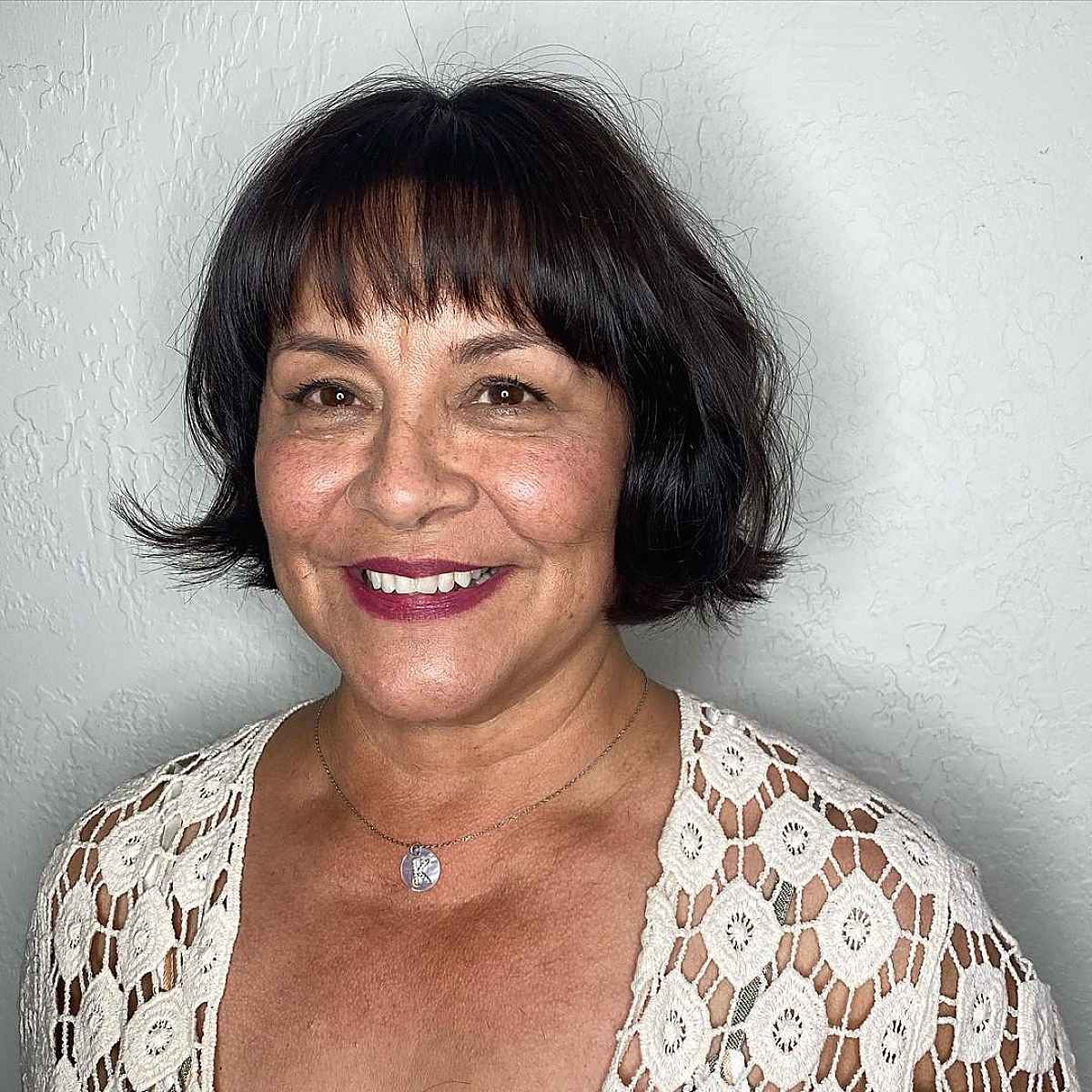classy bob with bangs for older women over sixty 1