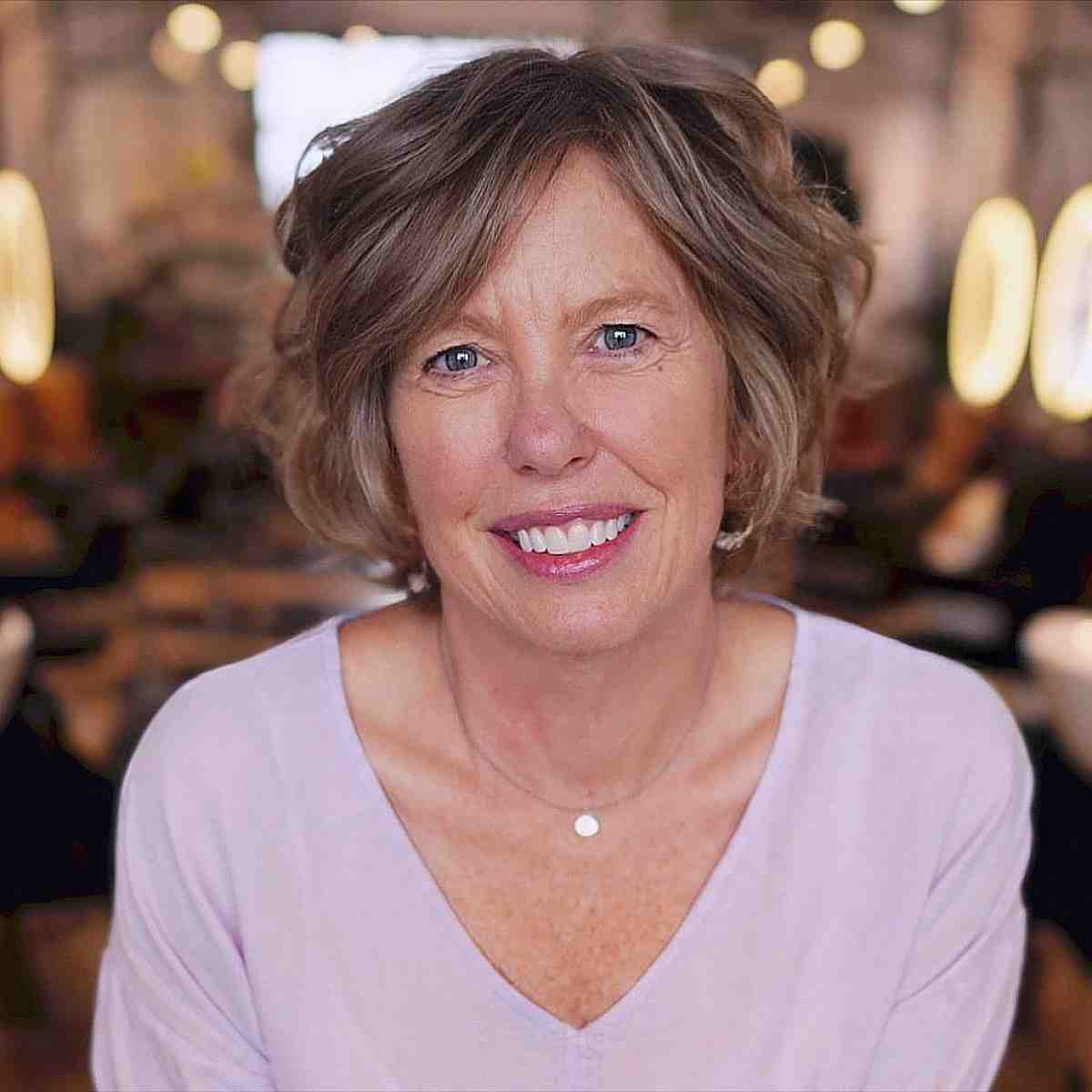 classy jaw length bob with long bangs for ladies over 60