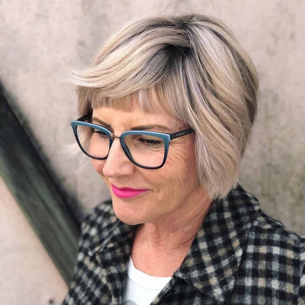 grandma inspired short bob for women aged 60 with glasses 1