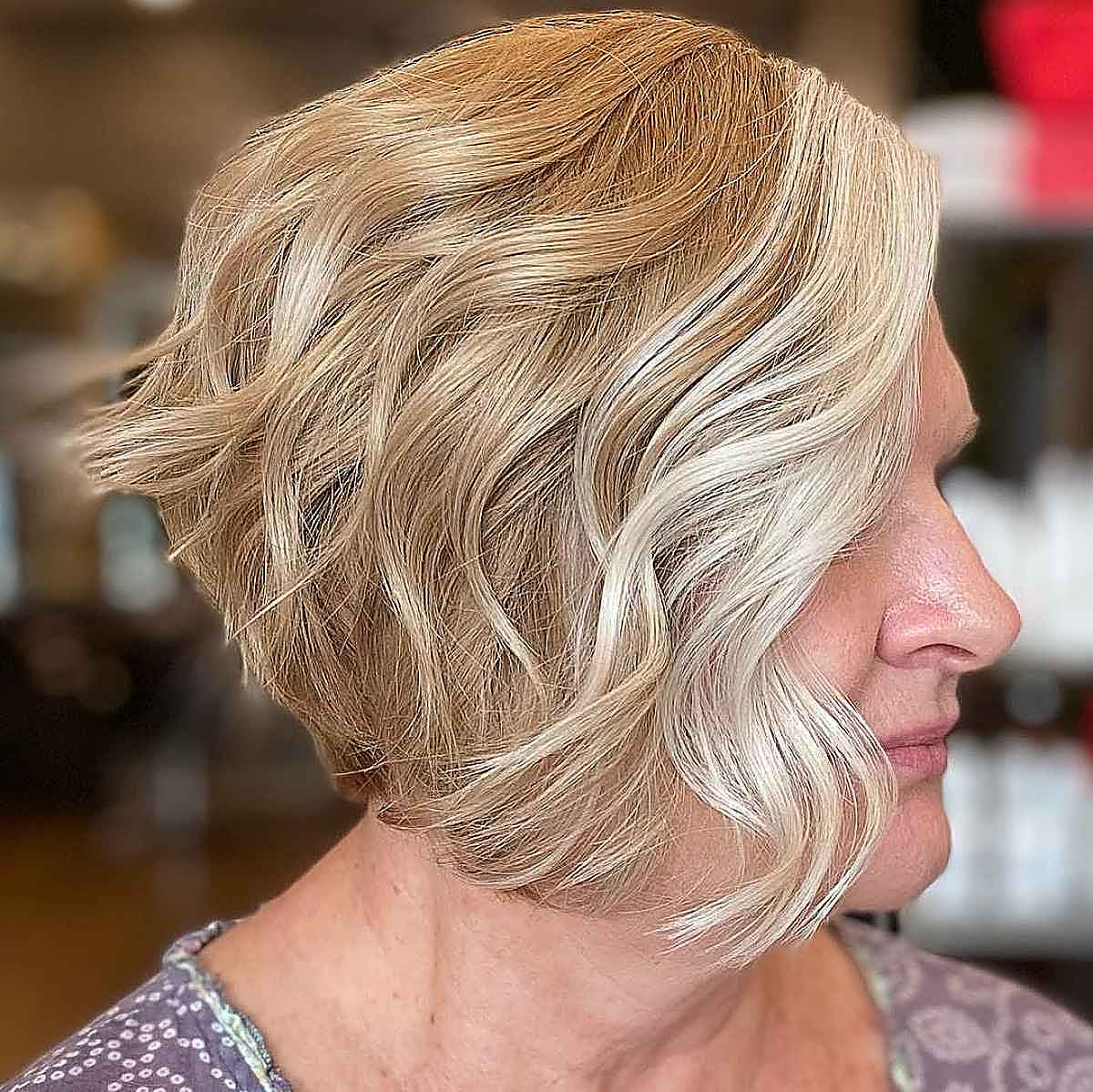 layered inverted bob for an older woman over 60 with fine hair