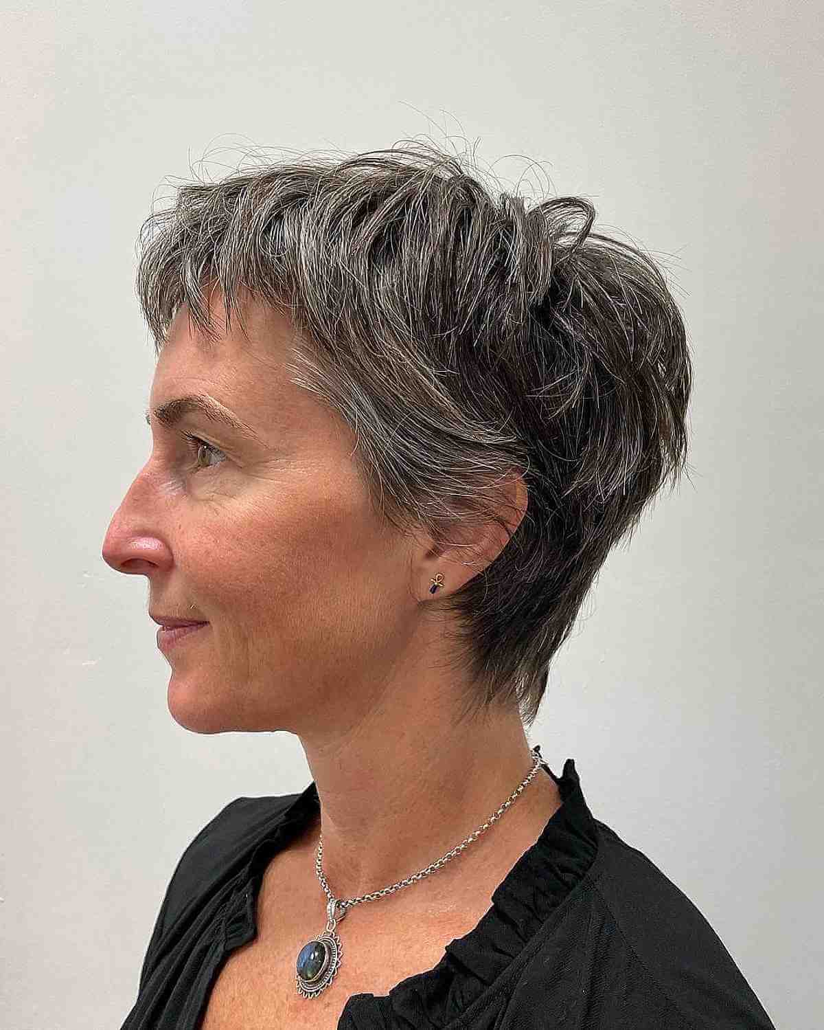 layered pixie with micro bangs for ladies past 40