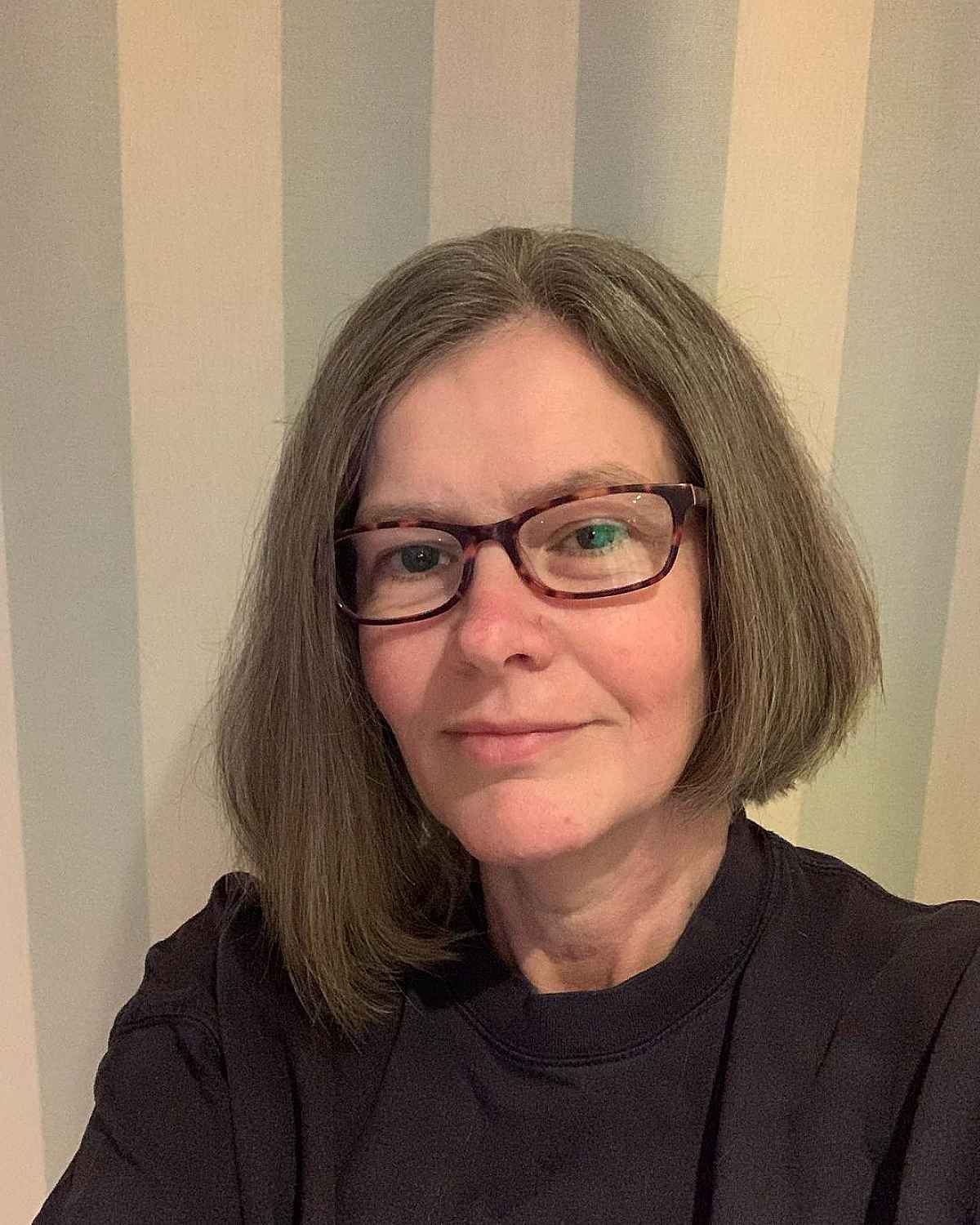 long asymmetrical bob for women over sixty with thick hair