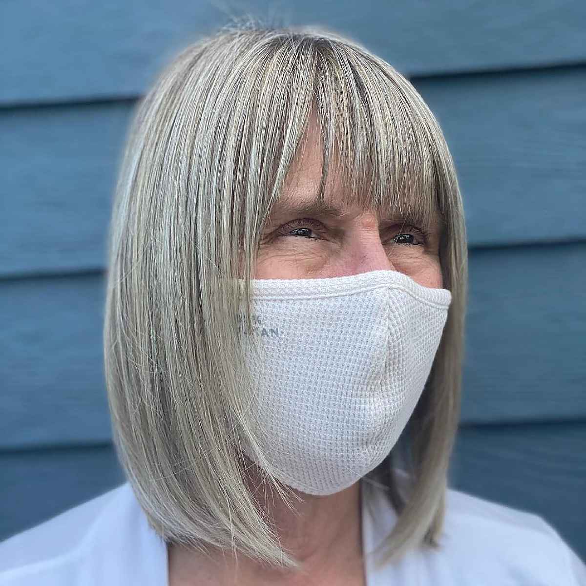 long blunt bob with a fringe for straight hair over 60