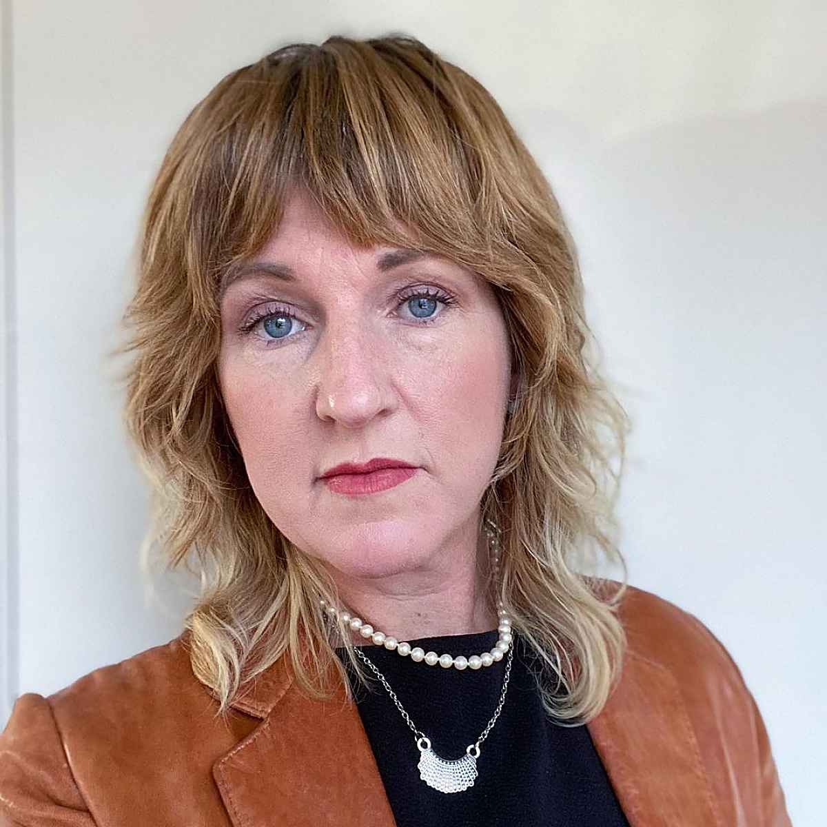 low maintenace mid length shag for thin haired 60 year olds