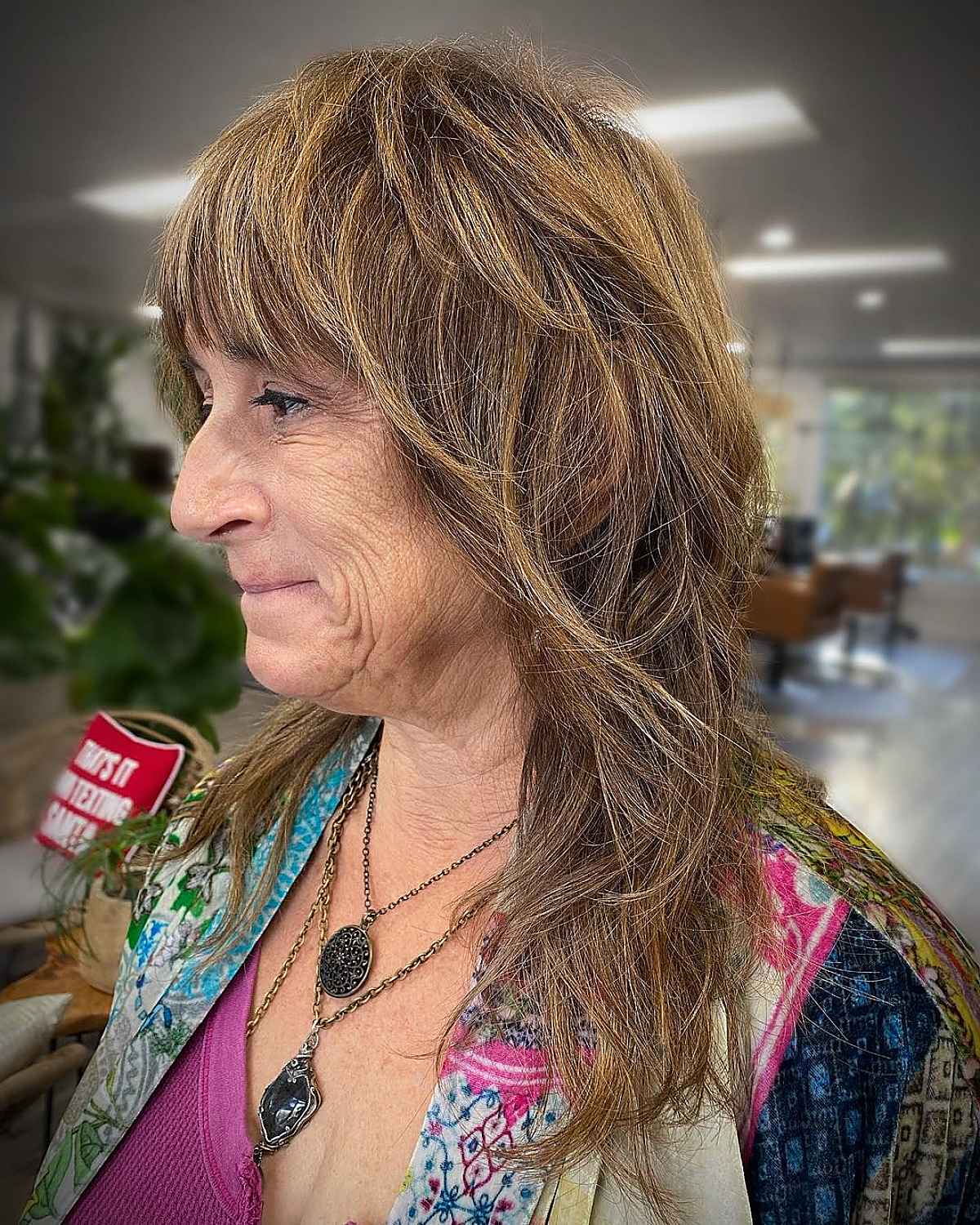 medium length mullet shag with textured layers for ladies over 60
