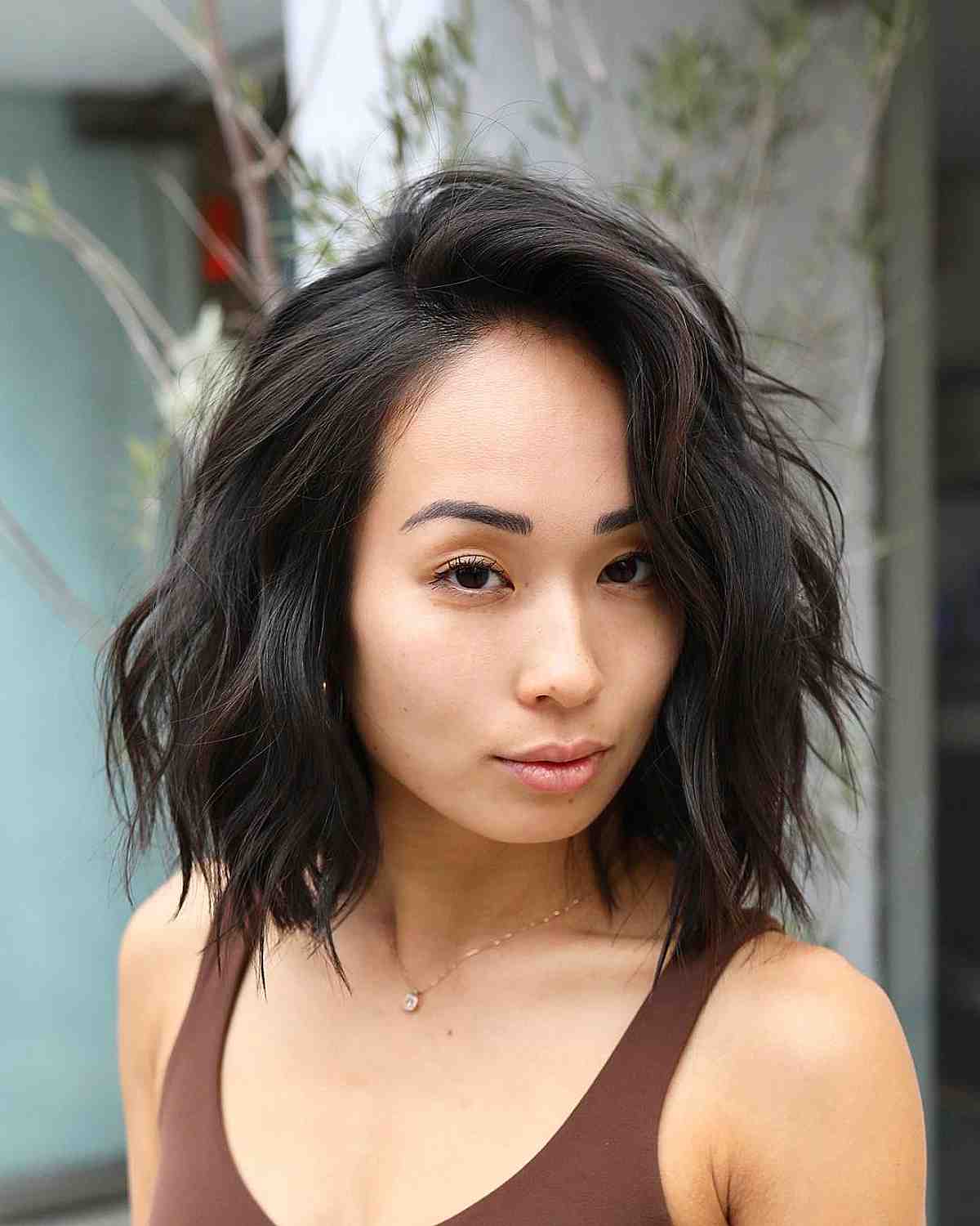 messy side parted choppy lob