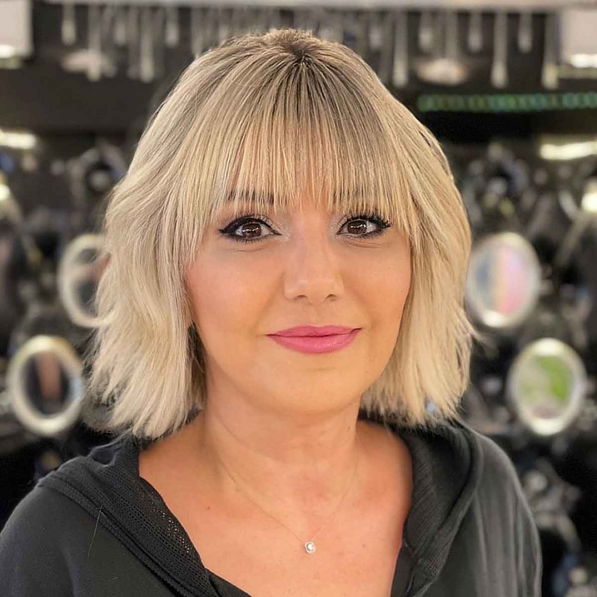 modern chin length bob with bangs