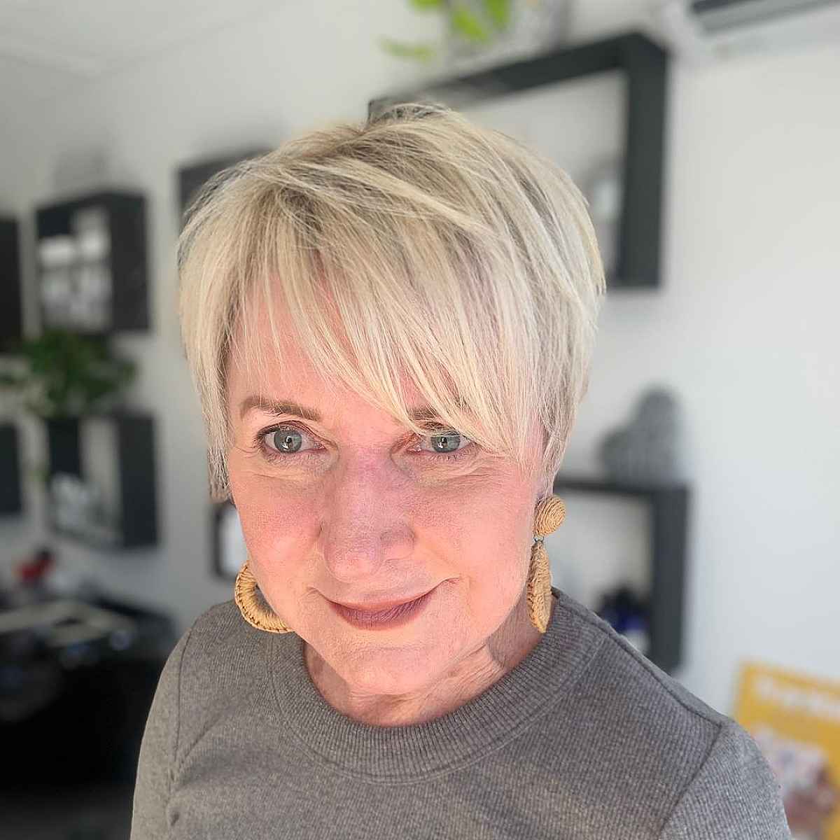 pixie with bangs for women over sixty with thinning hair