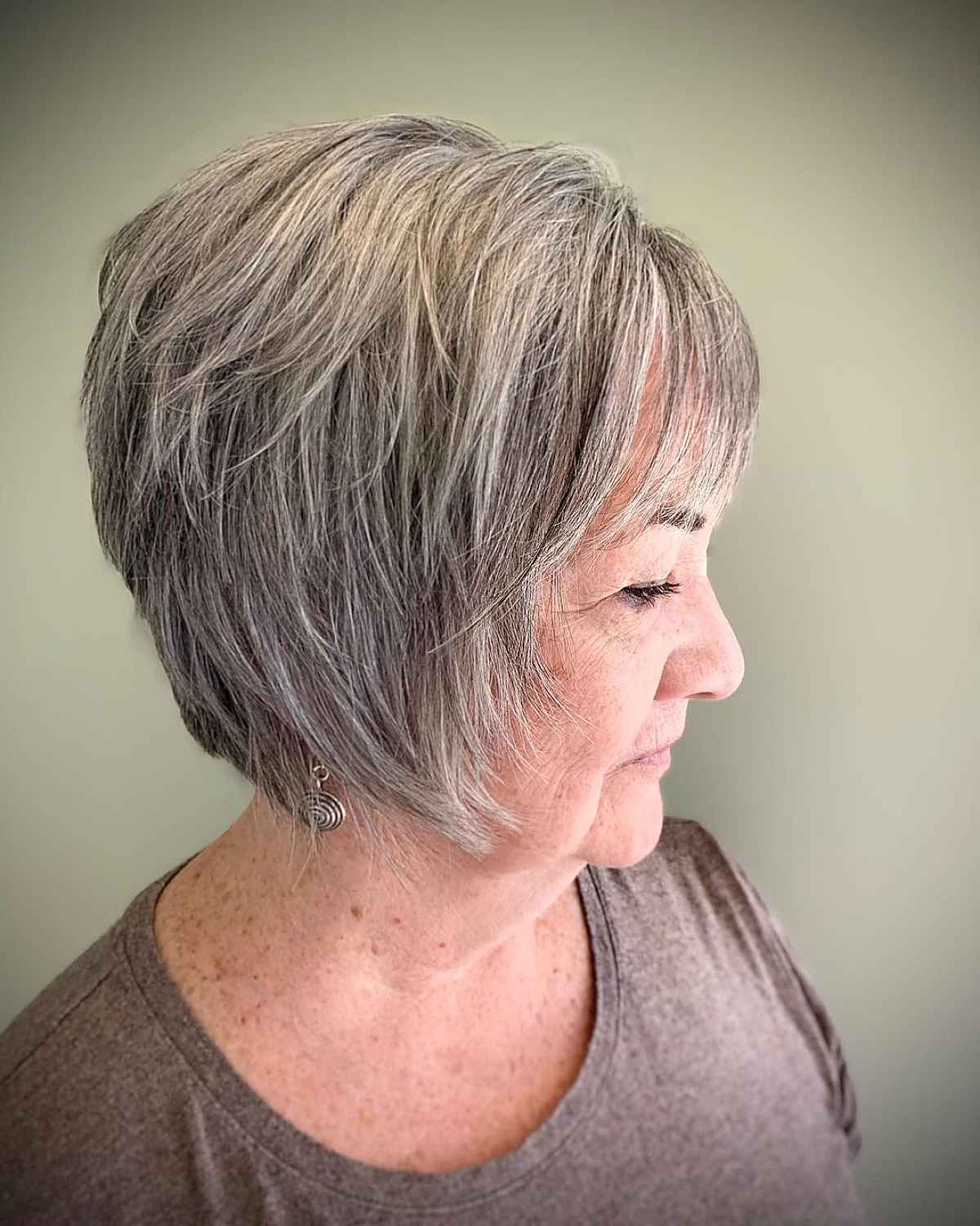 salt and pepper short bob with choppy layers for 60 year old ladies