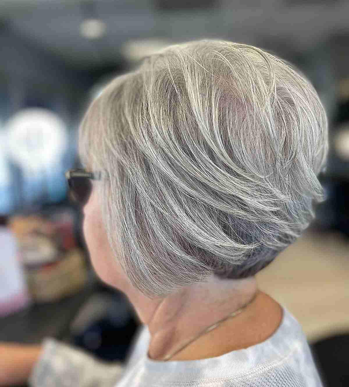 salt and peppered short stacked bob
