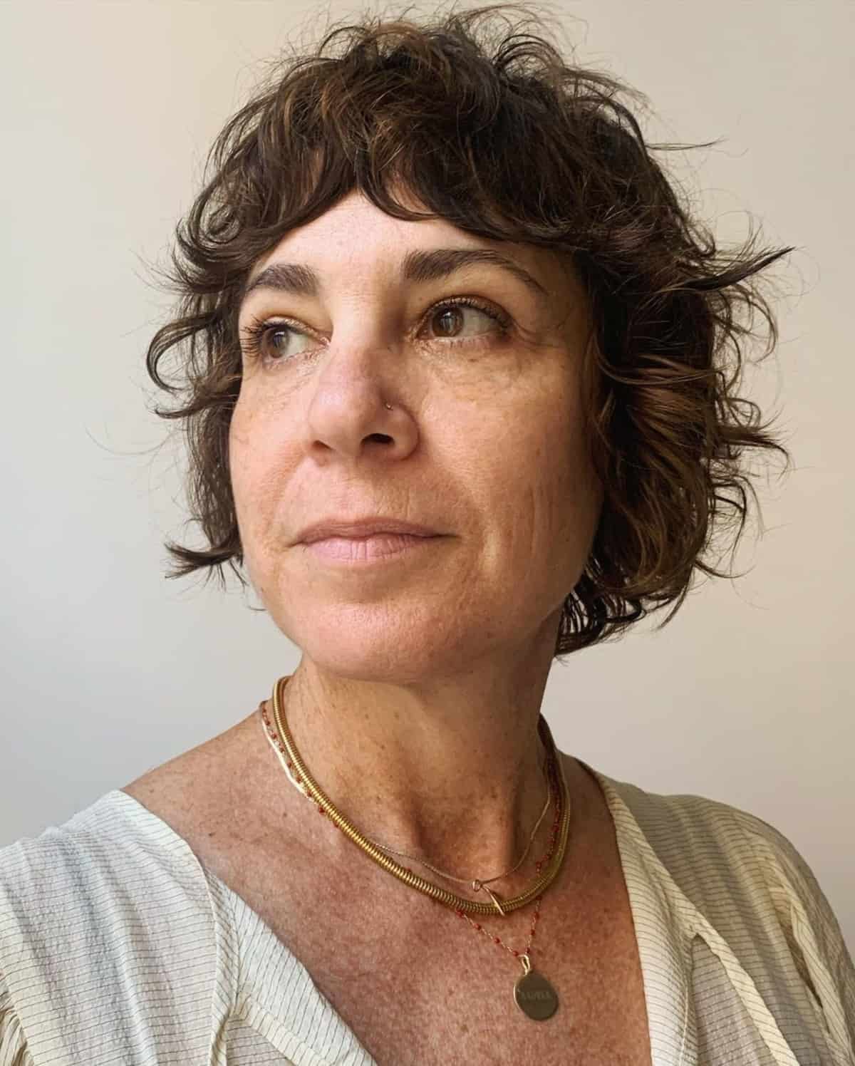 short shaggy bob with curtain bangs for 60 year olds