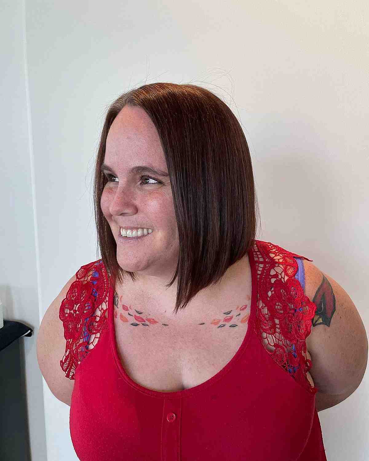 sleek neck length cut with blunt ends for 40 year old women