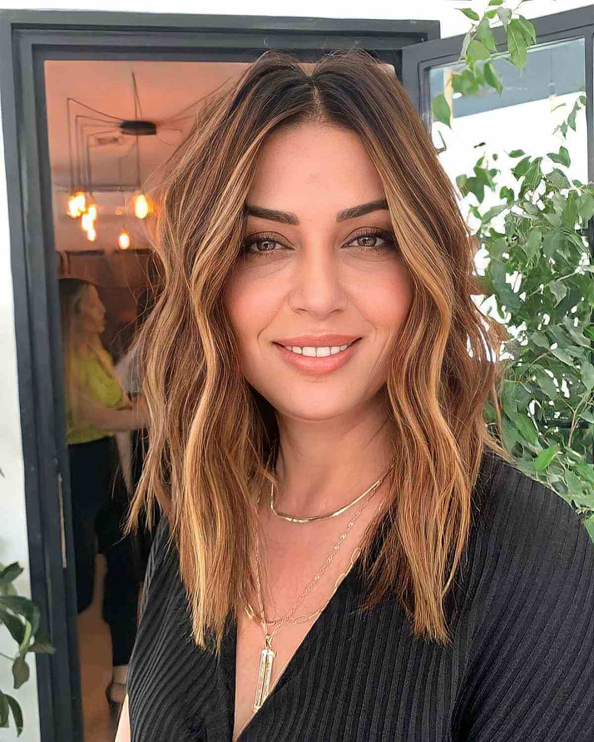 sun kissed medium length hair for ladies 40 and over