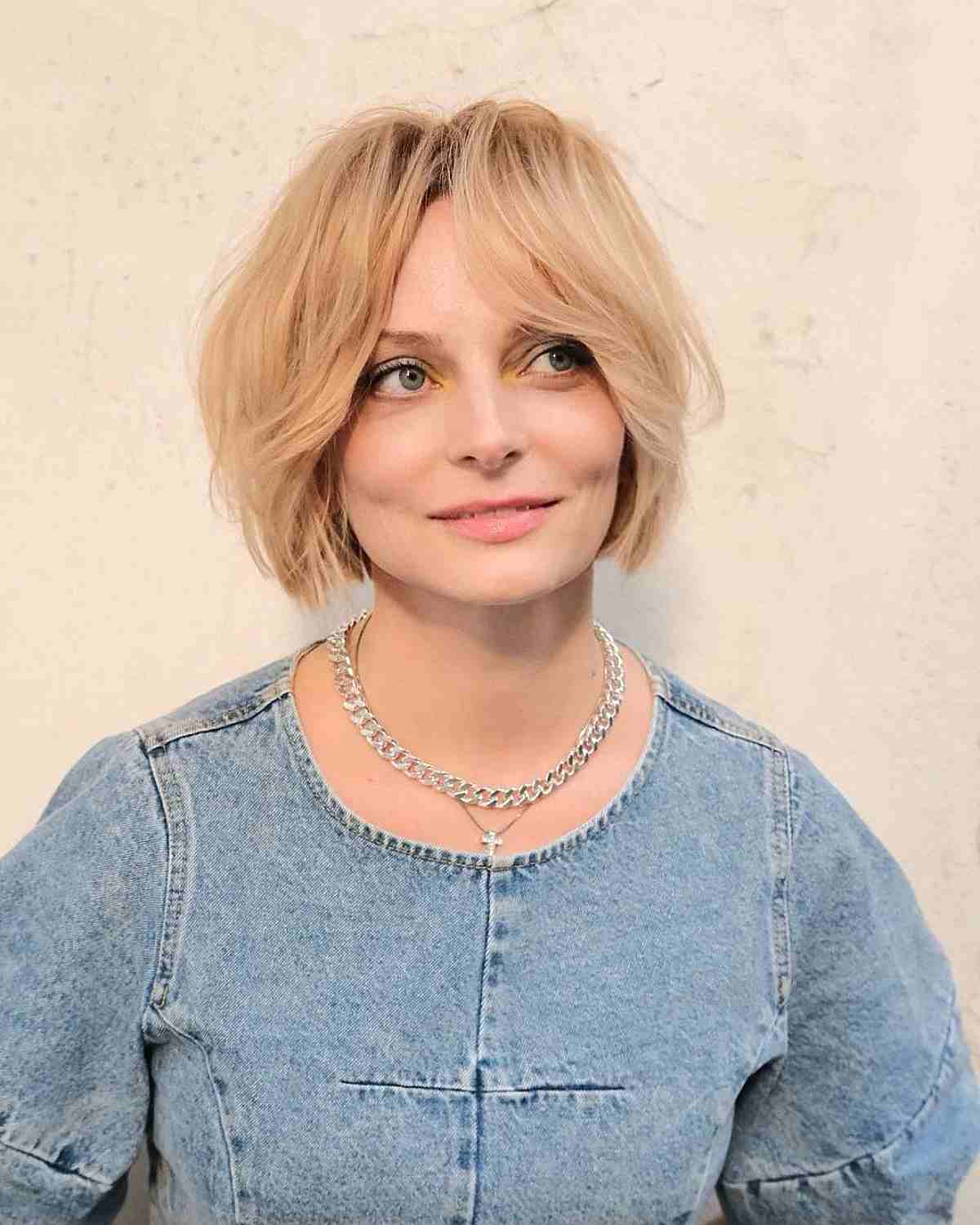 tousled short bob with face framing bangs for forty year olds