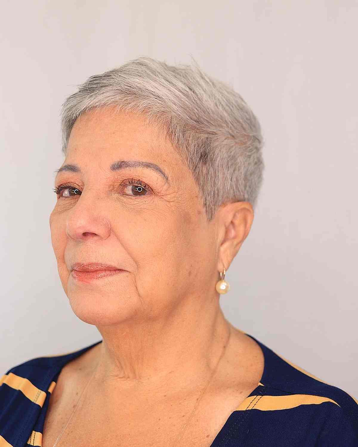 very short silver pixie for ladies 60 and over with thin hair