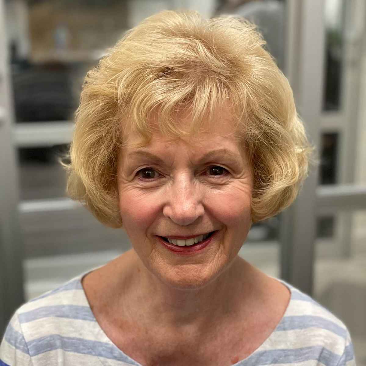 youthful bob with feathered layers for ladies over 60 1