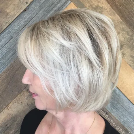 Ash Blonde Layered Bob with Bangs