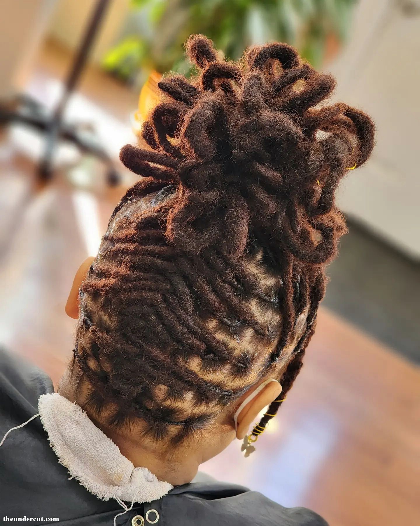 Mens Braided Hair High Up Bun