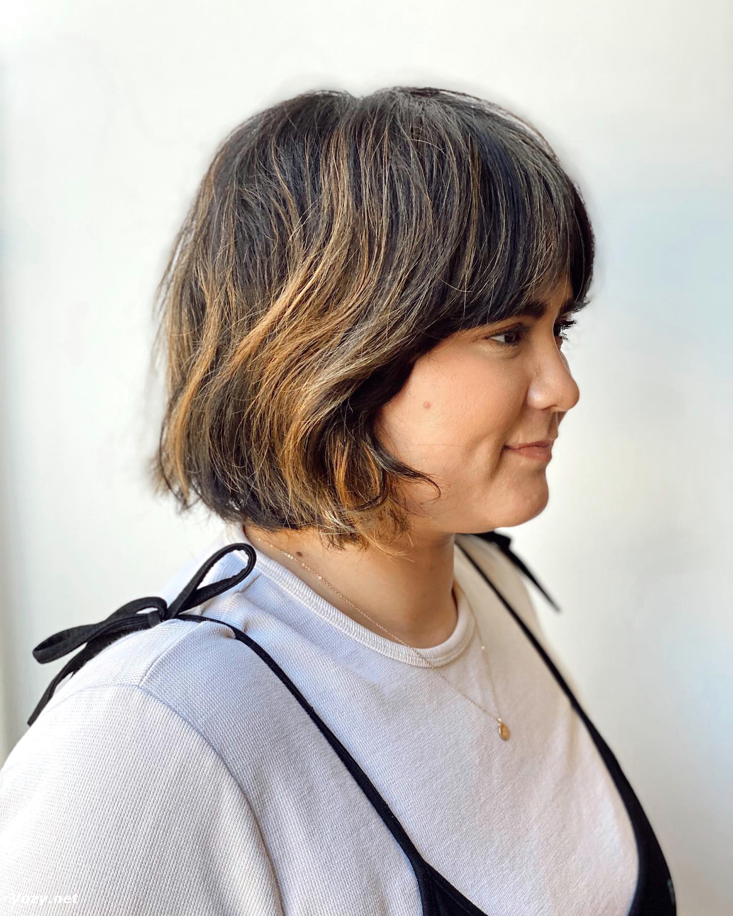 Razor Bob Haircut With Highlights