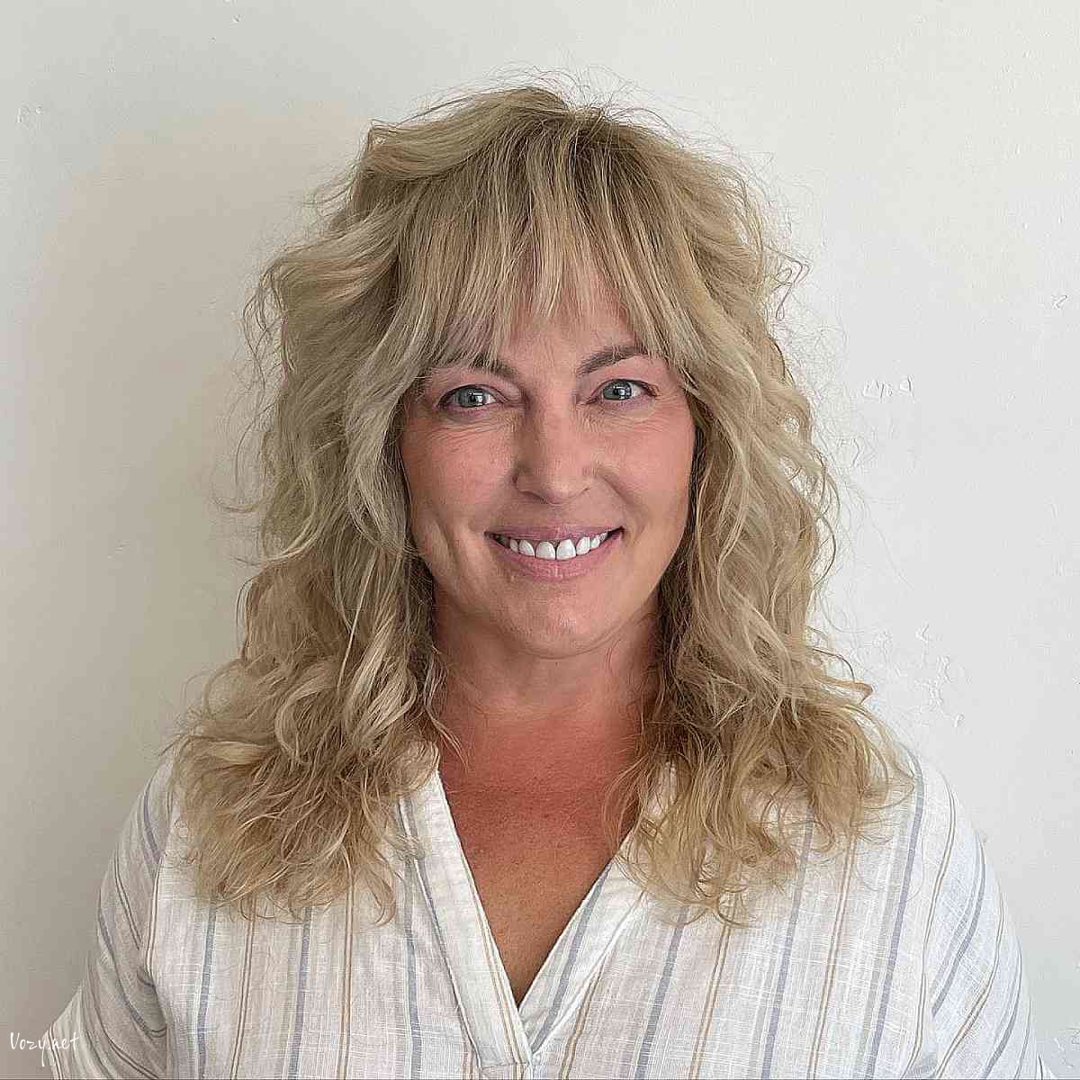 adorable curled shag with straight bangs
