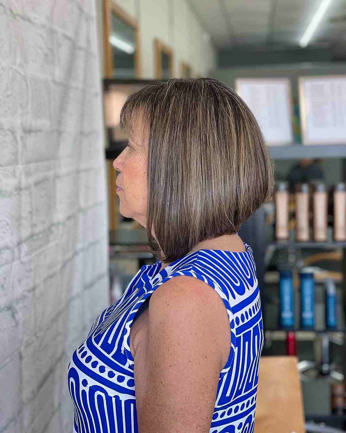 angled stacked bob with lowlights for women 60 and over