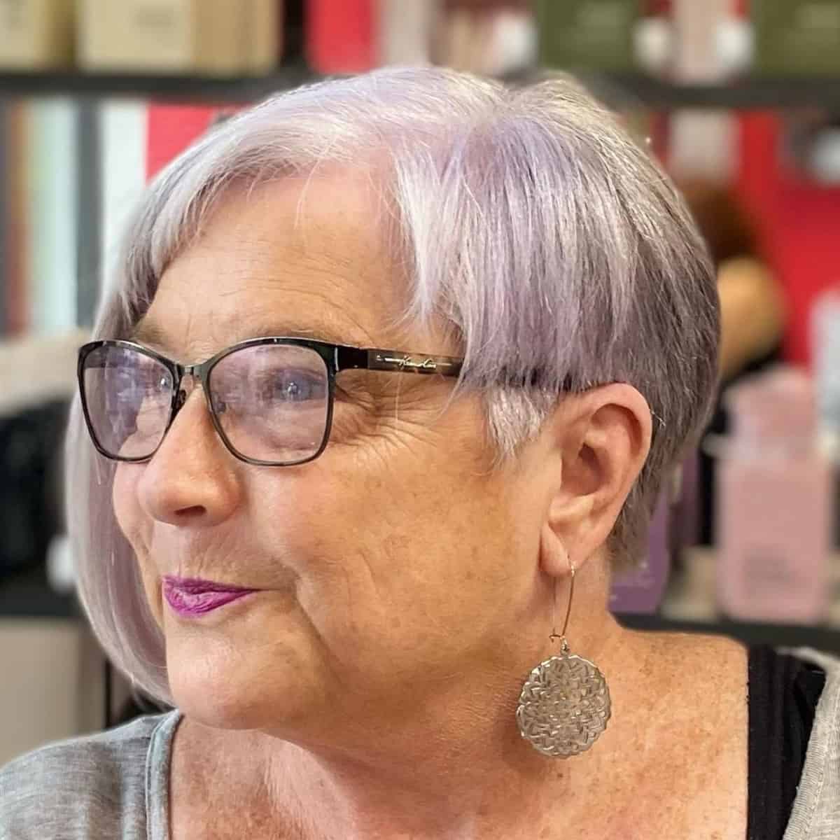 asymmetrical bob for women 70 with glasses