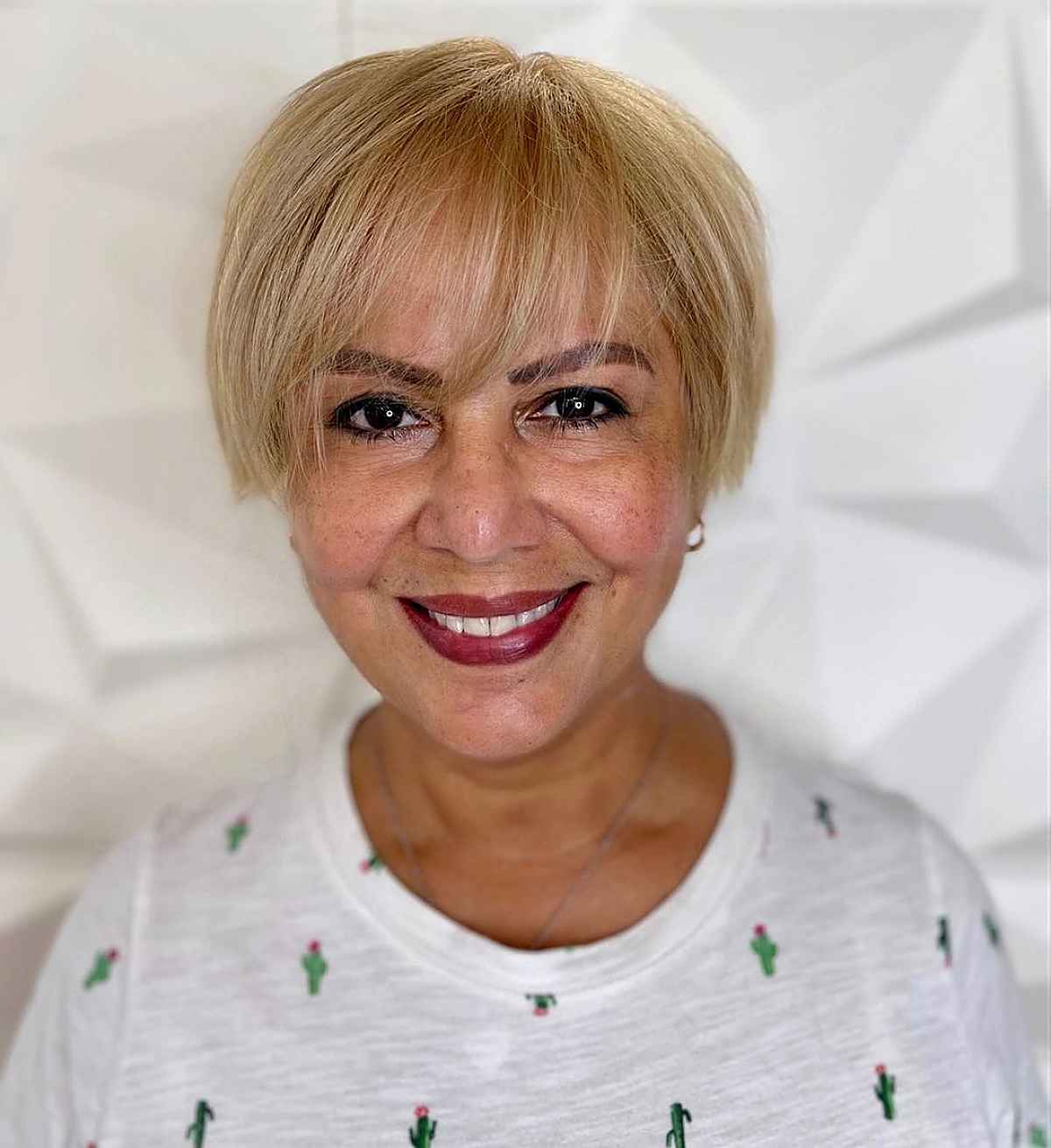 bixie haircut with thin bangs for sixty year olds