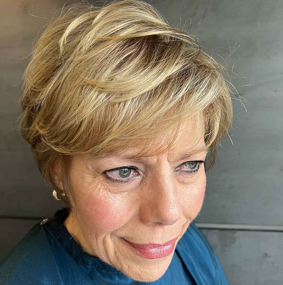 bixie with feathered layers for fine hair for women in their sixties