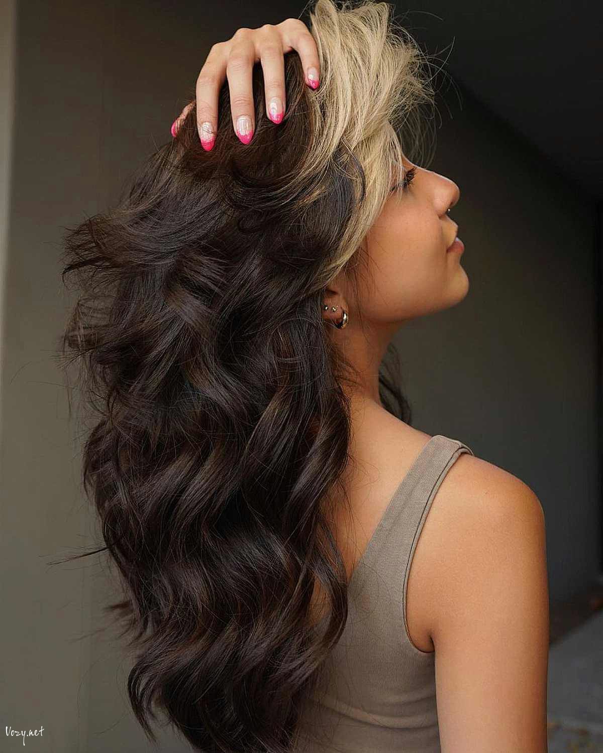 blonde highlighted curtain bangs on medium length hair