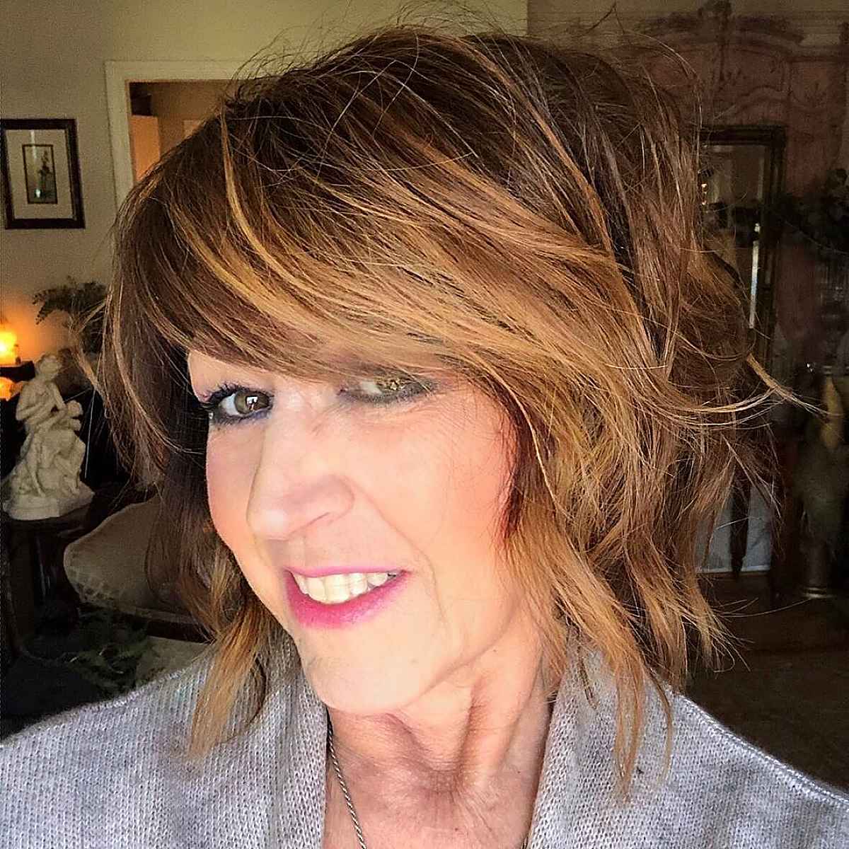 bob with side swept bangs for ladies passed sixty