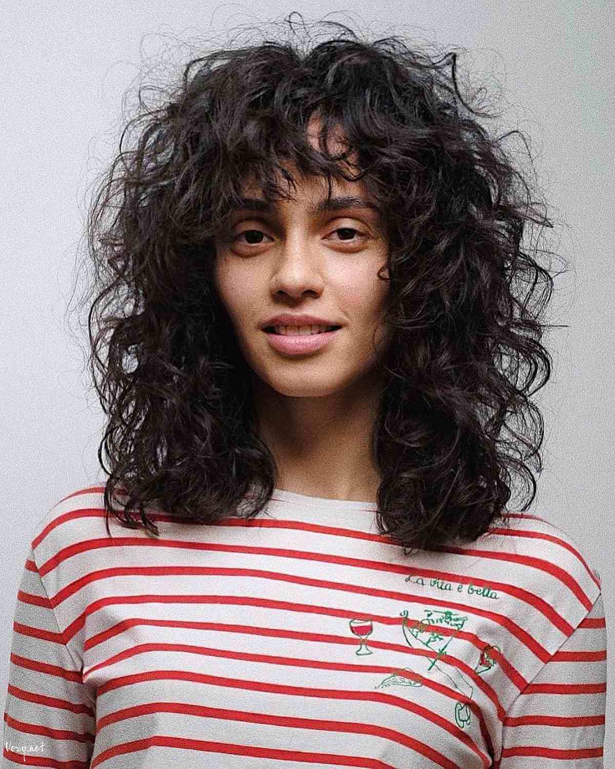 charming curly shag with choppy bangs