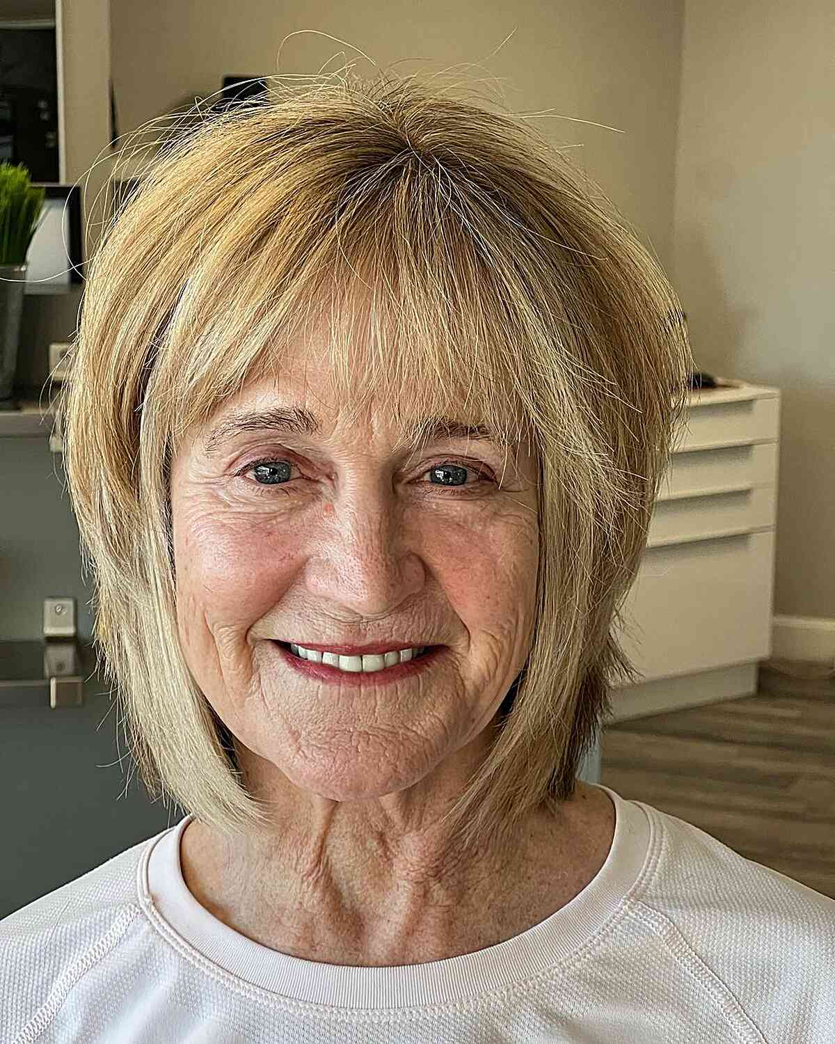 choppy blonde shaggy bob for ladies over 70