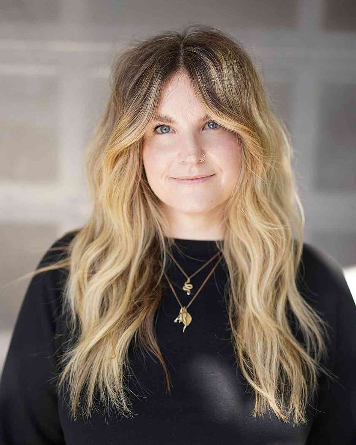 classic long round layers and long curtain bangs