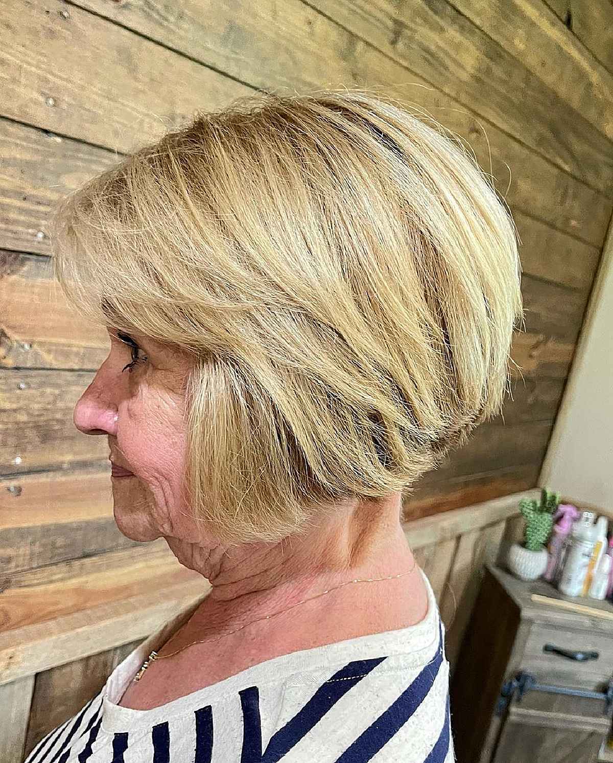 classy angled bob cut for thick hair for older women past 60