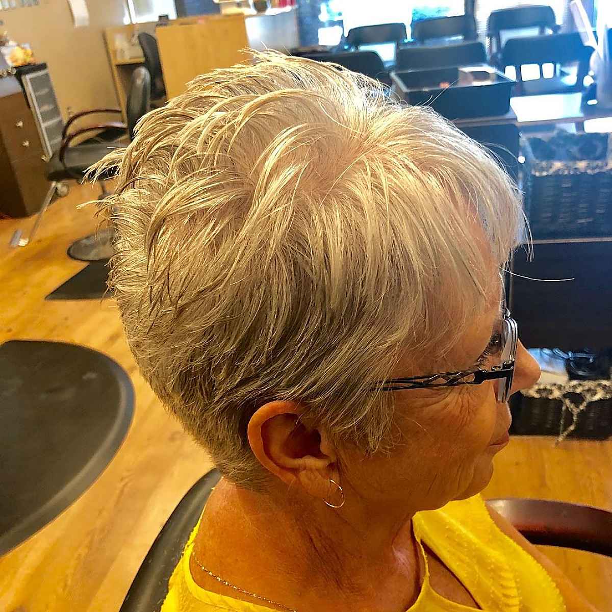 classy pixie cut for women over 60 with glasses