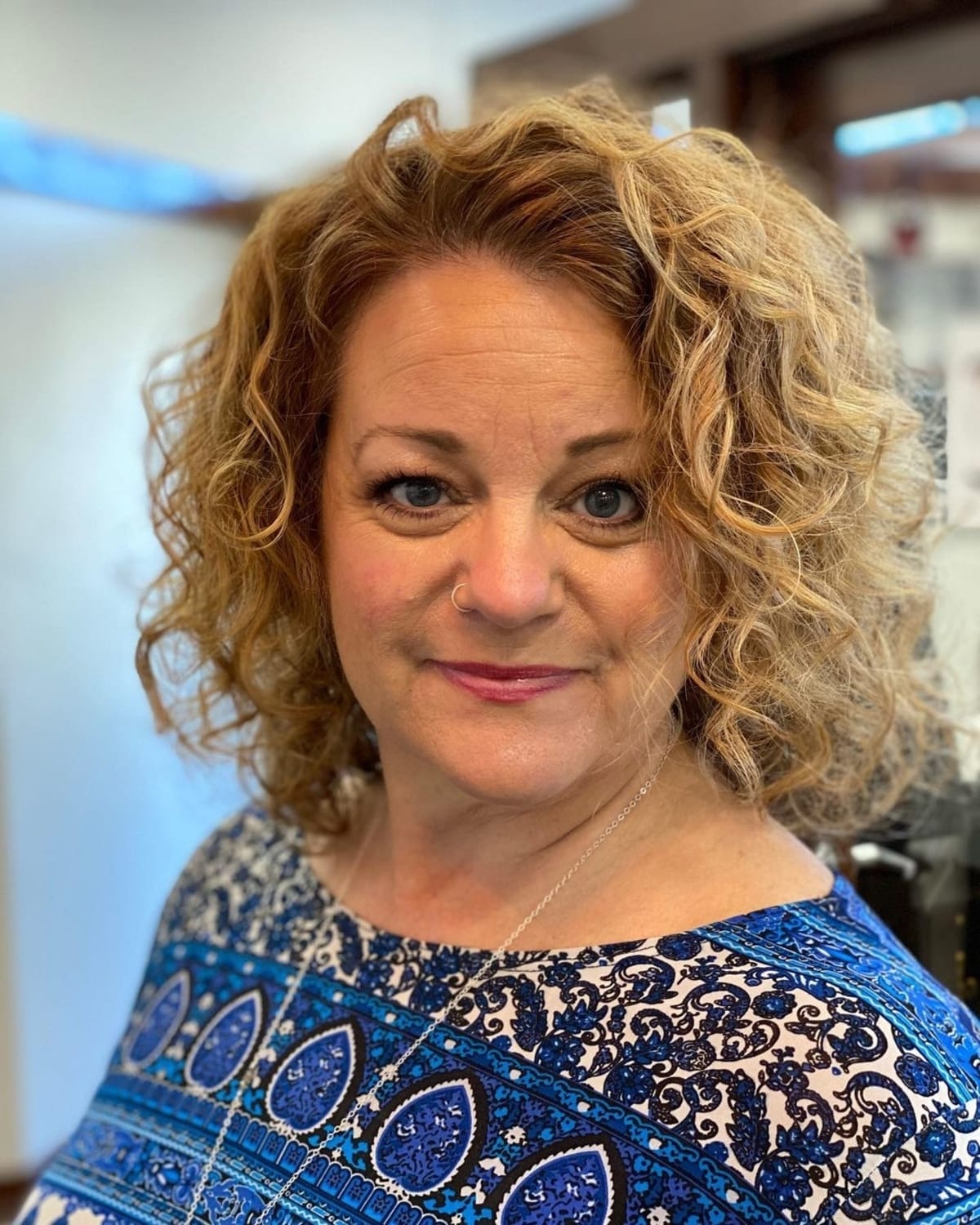 curly hair style for senior women with round face