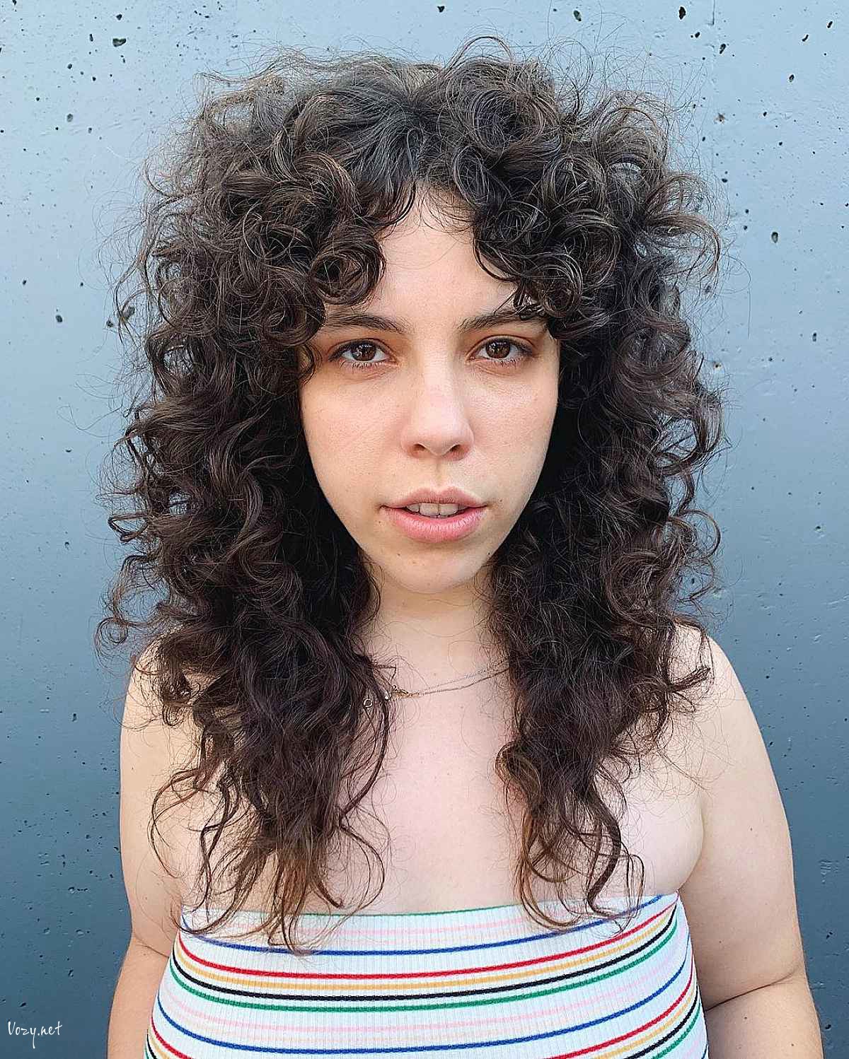 curly shag with curly curtain bangs