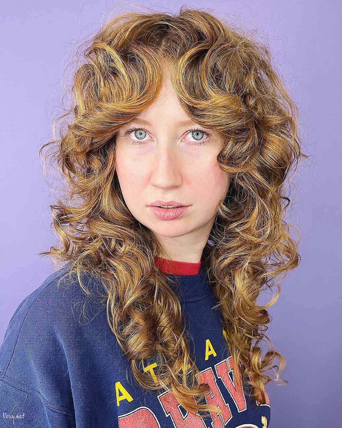 curly shag with razored layes and curtain fringe
