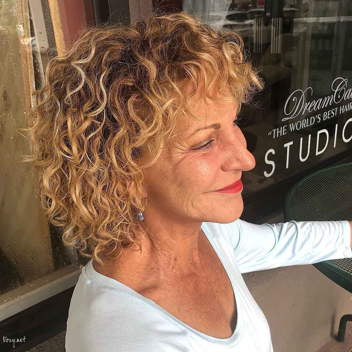 curly textured haircut for women over 50