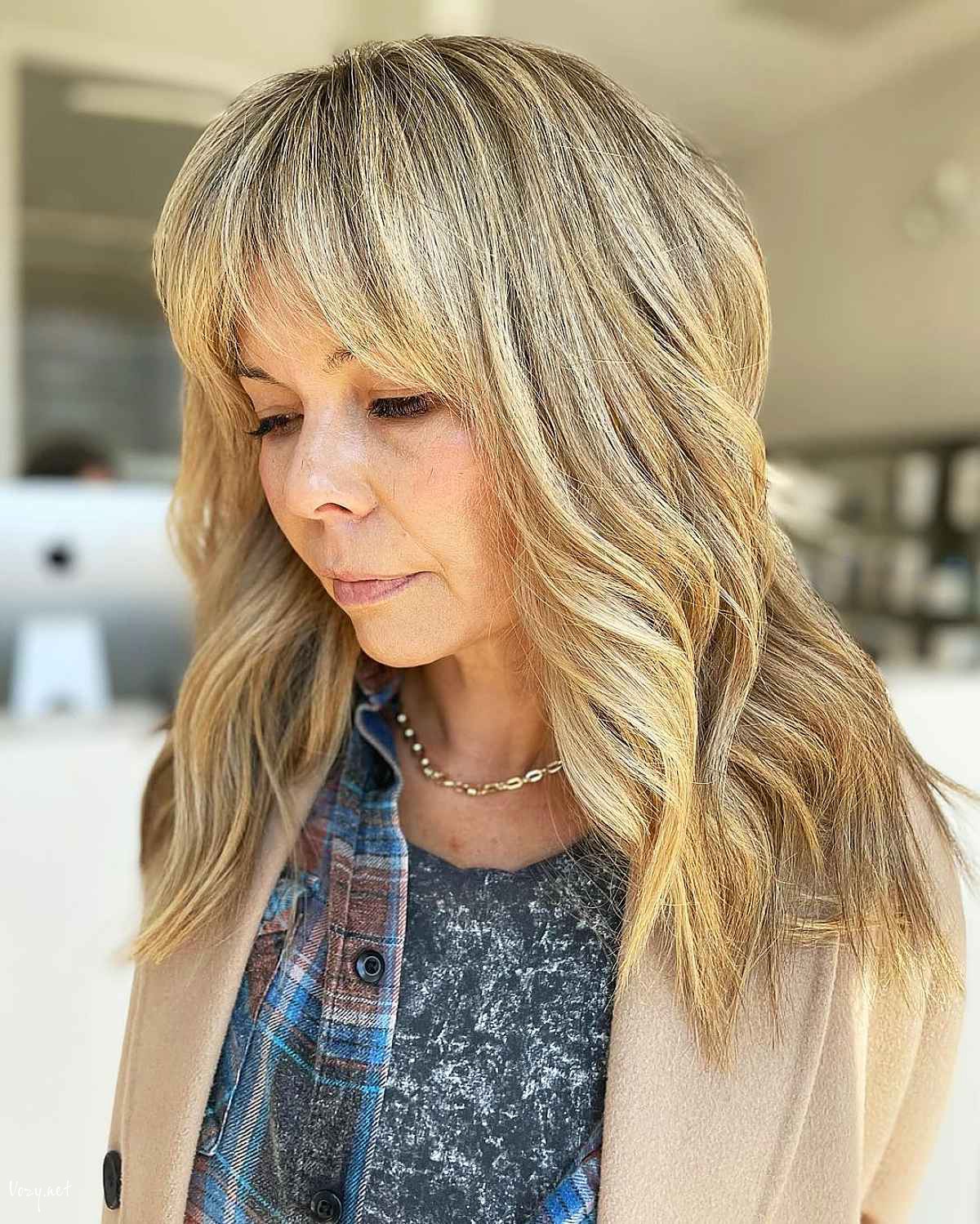 curtain bangs on mid length wavy hair