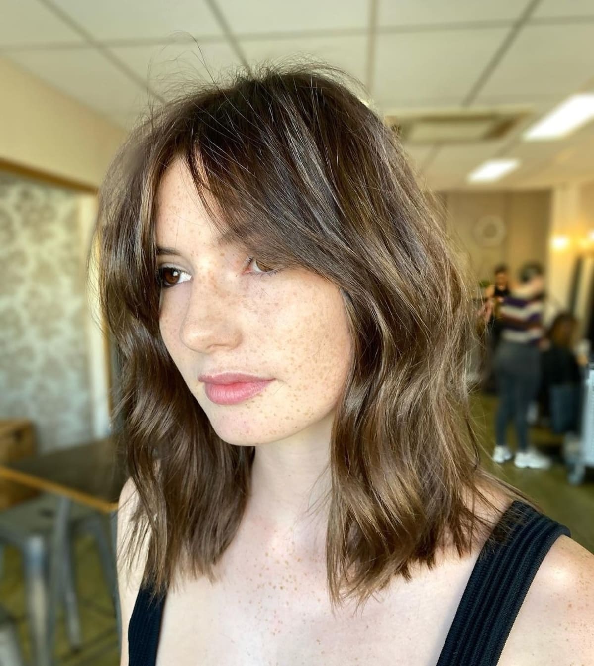 curtain fringe on a long bob
