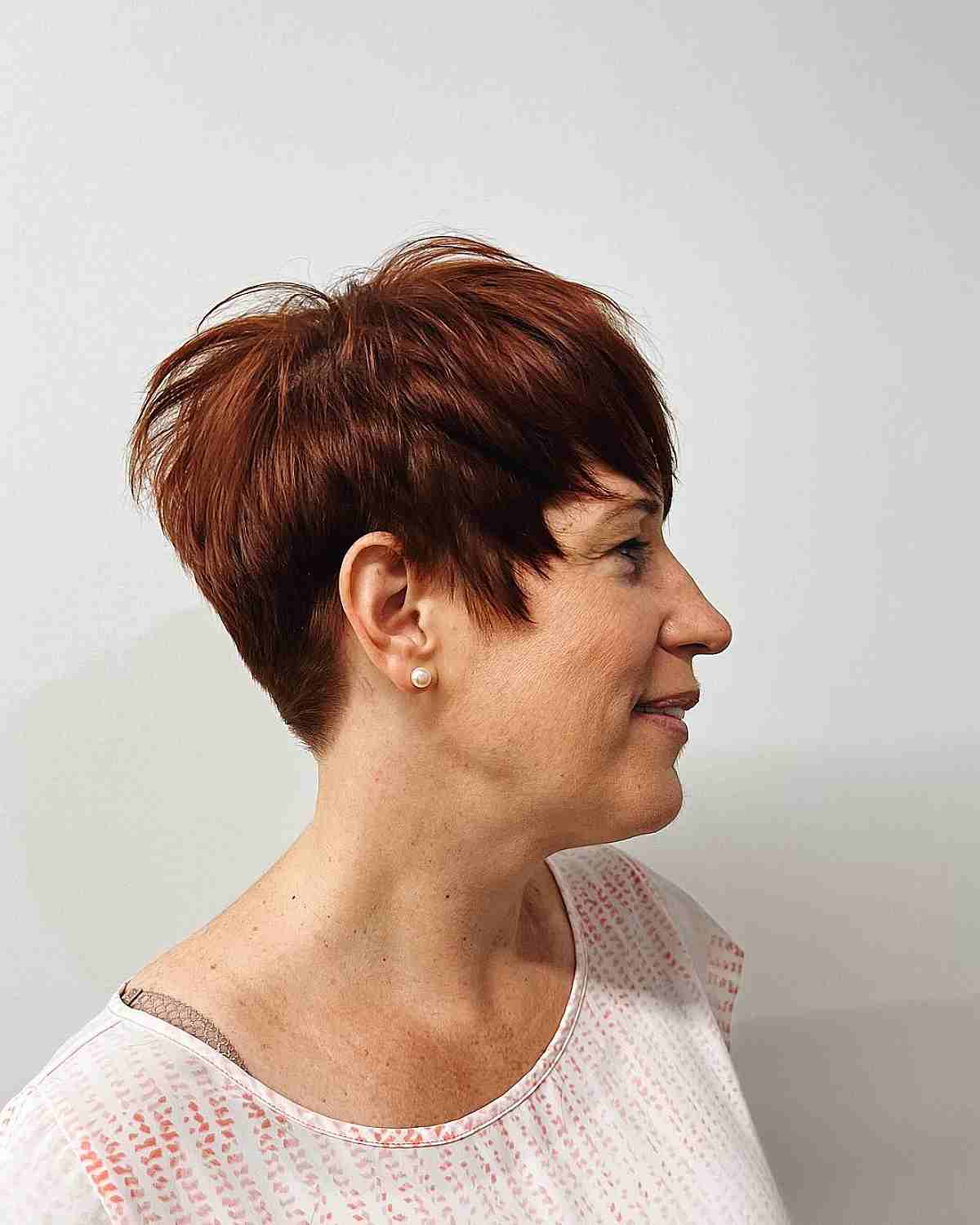 dark auburn pixie with sideburns for ladies 50 and over