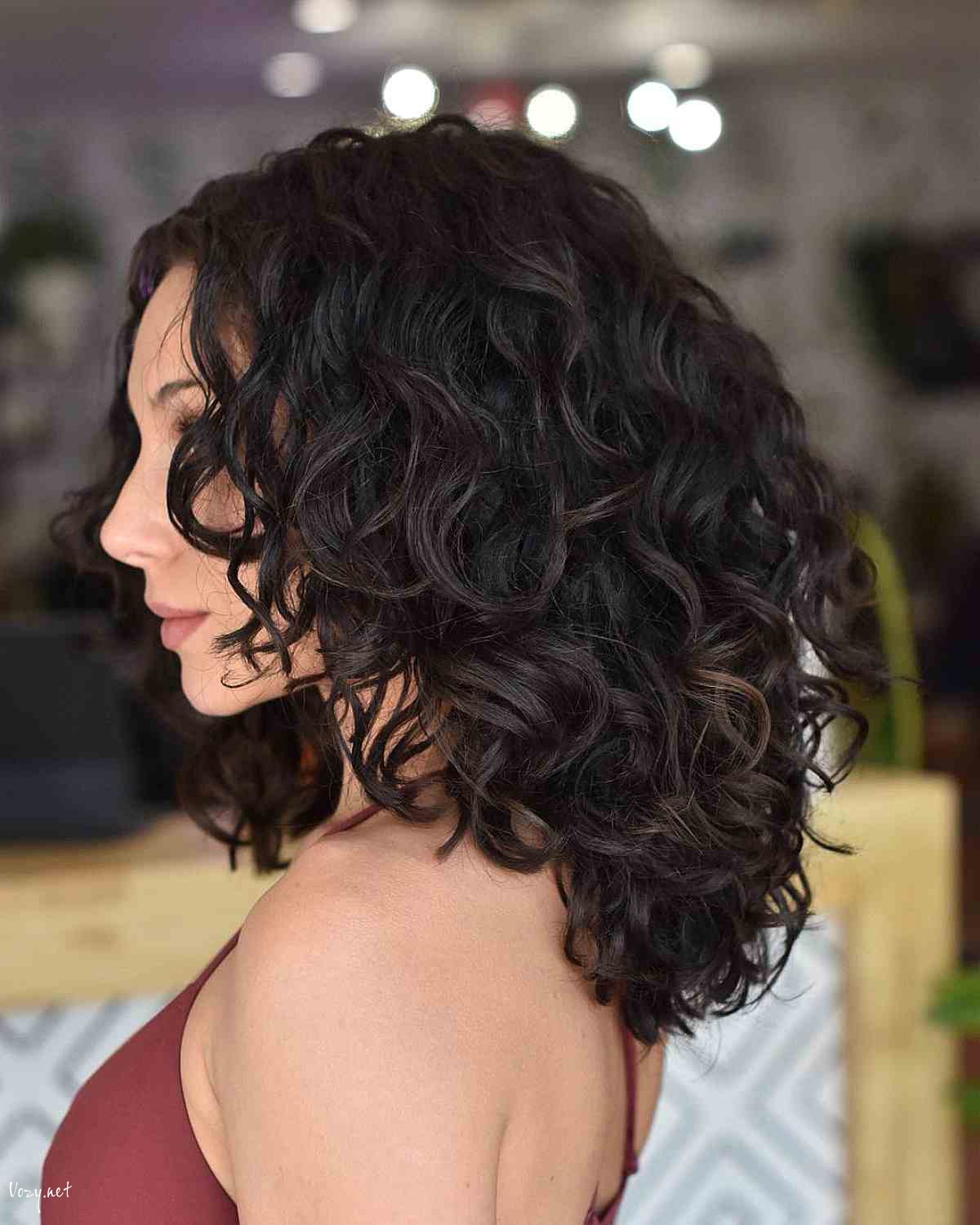 dark brown natural curls and layers
